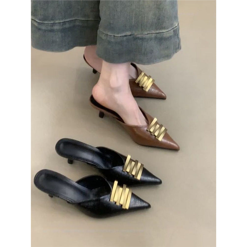 Ladies pointed toe leather look mules with sculpted kitten heel and gold wave appliqué Mune Fashion