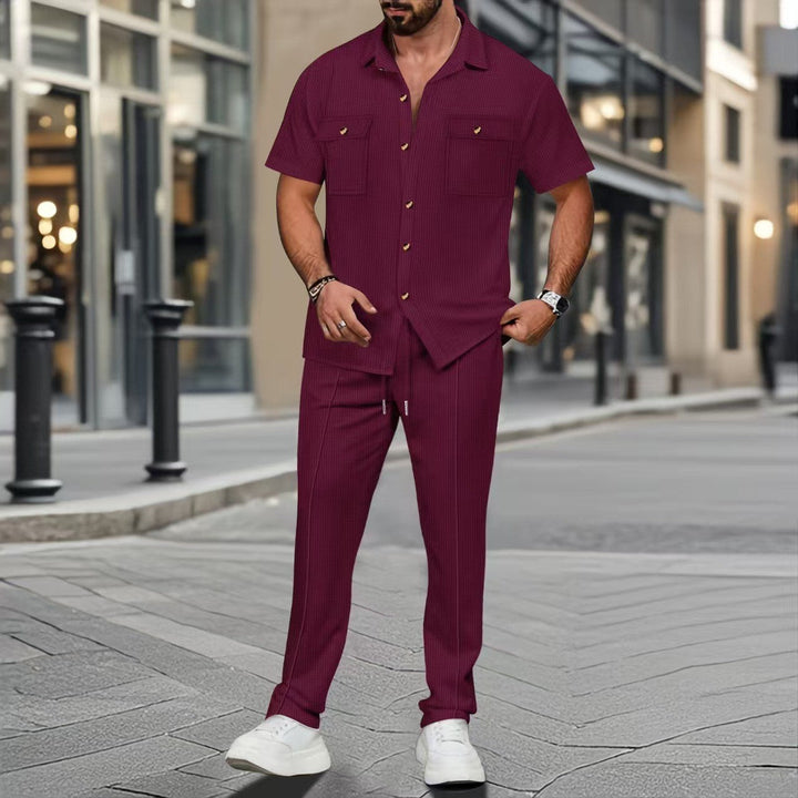 Men's casual two-piece set with open lapel shirt, chest pockets, and tapered drawstring pants Mune Fashion