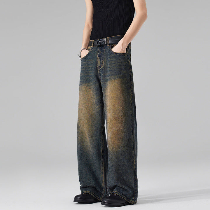 Women Ultra Wide Floor-Length Denim Palazzo Pants with Sculptural Width and Soft Bleach Accents Mune Fashion