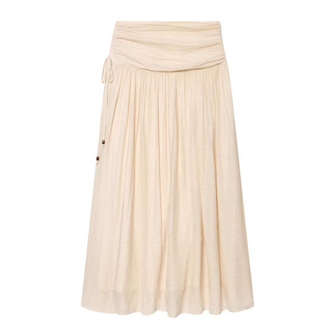 Women's midi skirt with high turnover waistband, fine pleat detailing and wooden button detail Mune Fashion