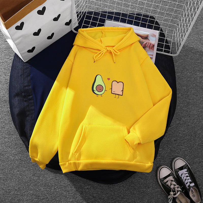 Women's cozy hooded sweatshirt with avocado toast illustration, soft fleece lining, and kangaroo pocket Mune Fashion