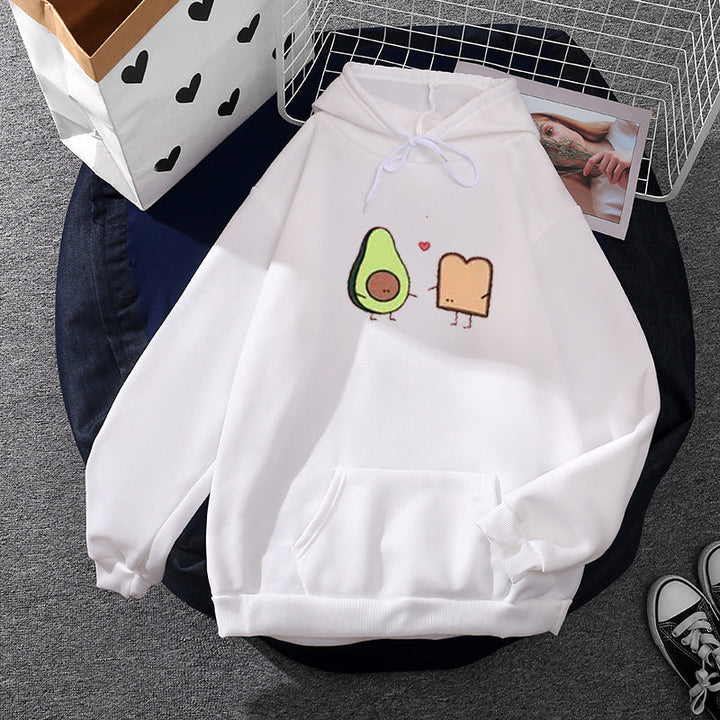 Women's cozy hooded sweatshirt with avocado toast illustration, soft fleece lining, and kangaroo pocket Mune Fashion