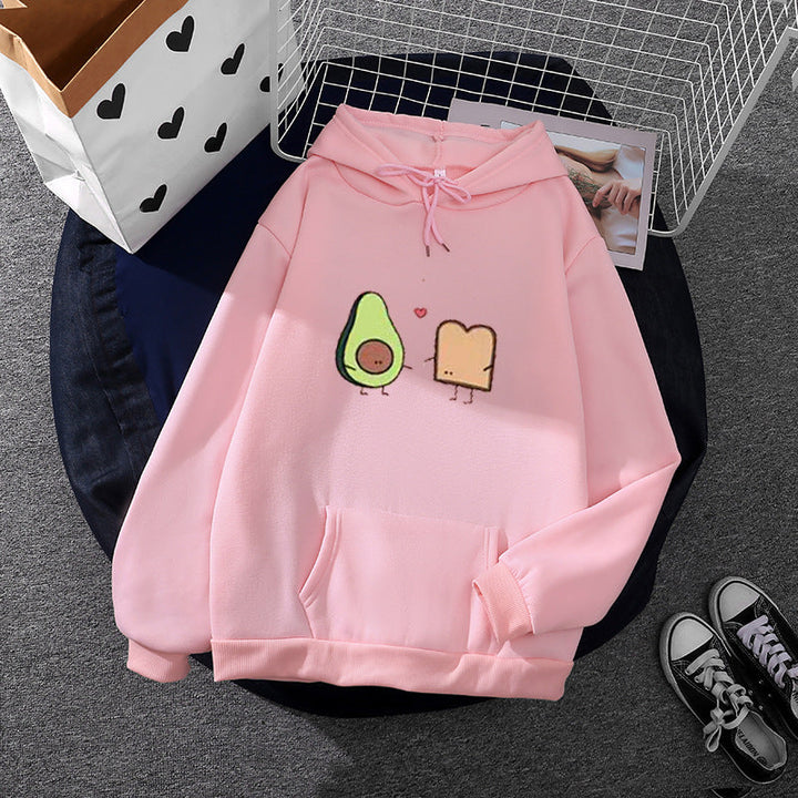 Women's cozy hooded sweatshirt with avocado toast illustration, soft fleece lining, and kangaroo pocket Mune Fashion