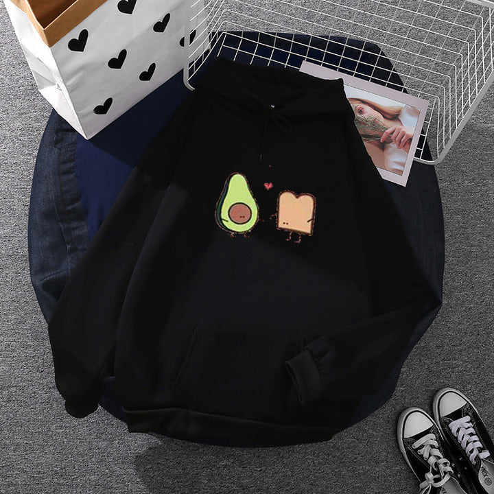 Women's cozy hooded sweatshirt with avocado toast illustration, soft fleece lining, and kangaroo pocket Mune Fashion