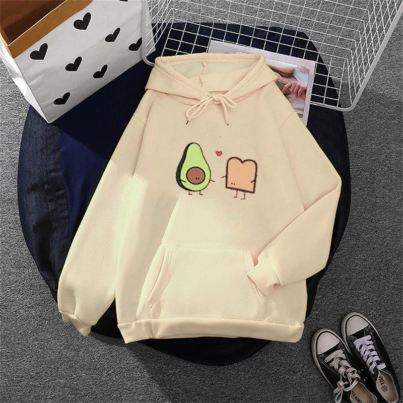 Women's cozy hooded sweatshirt with avocado toast illustration, soft fleece lining, and kangaroo pocket Mune Fashion