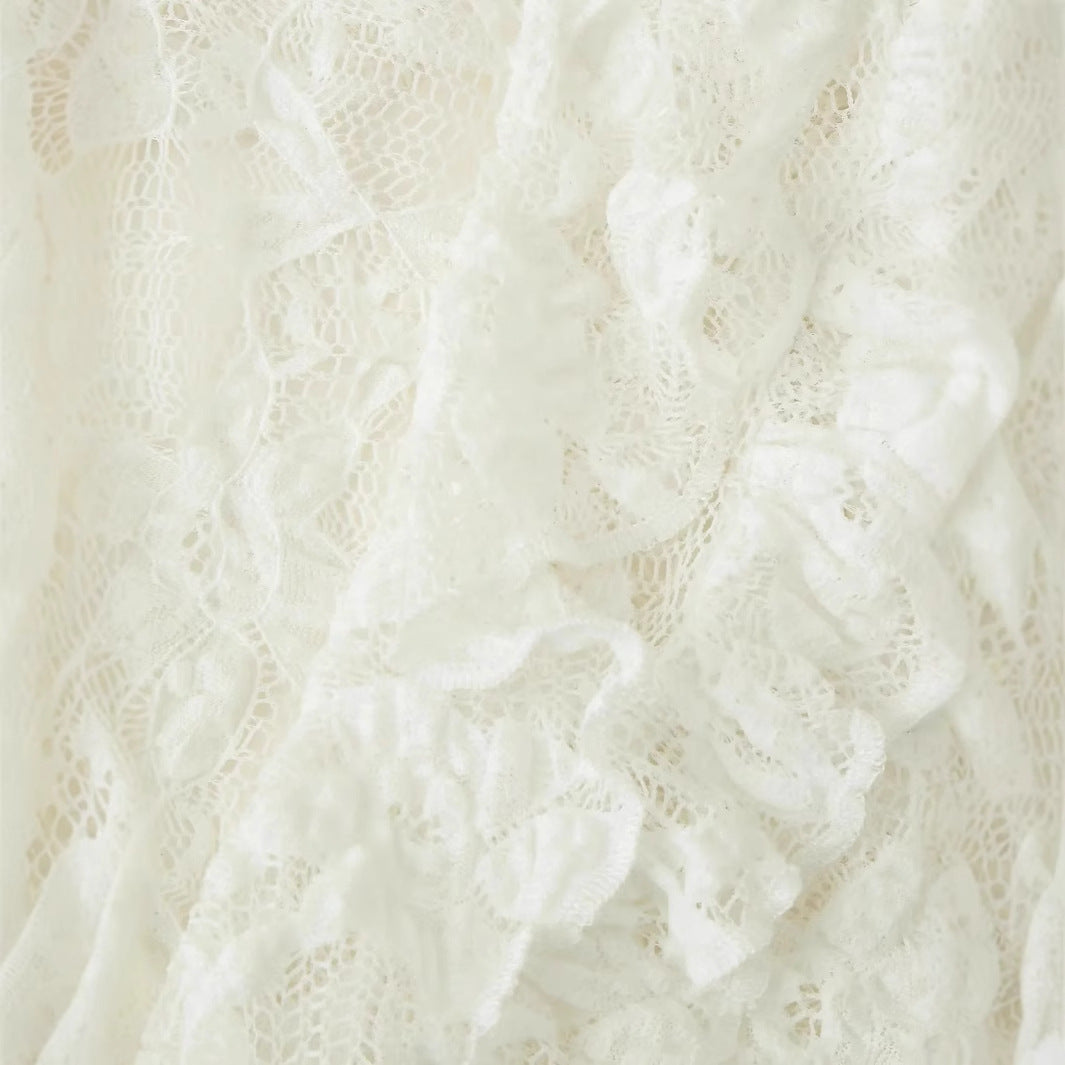 Women's lace blouse with deep V neckline, ruffled front and bell sleeves with tie bands Mune Fashion