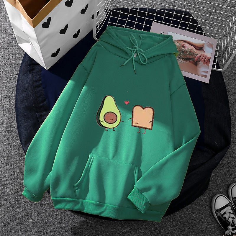 Women's cozy hooded sweatshirt with avocado toast illustration, soft fleece lining, and kangaroo pocket Mune Fashion