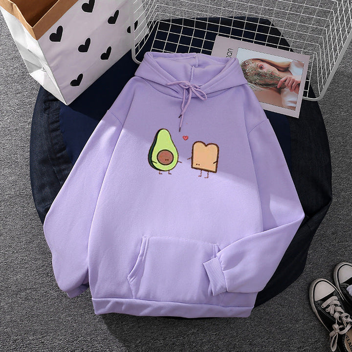 Women's cozy hooded sweatshirt with avocado toast illustration, soft fleece lining, and kangaroo pocket Mune Fashion