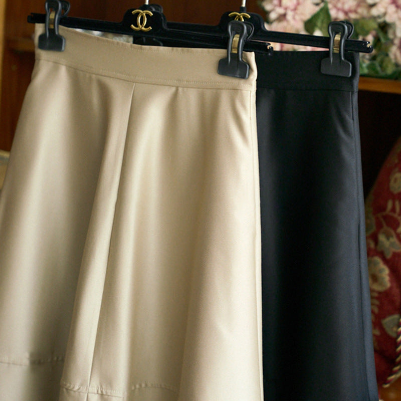 Women's midi skirt made of vegan leather with a high waist and tiered A-line Mune Fashion