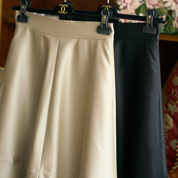 Women's midi skirt made of vegan leather with a high waist and tiered A-line Mune Fashion