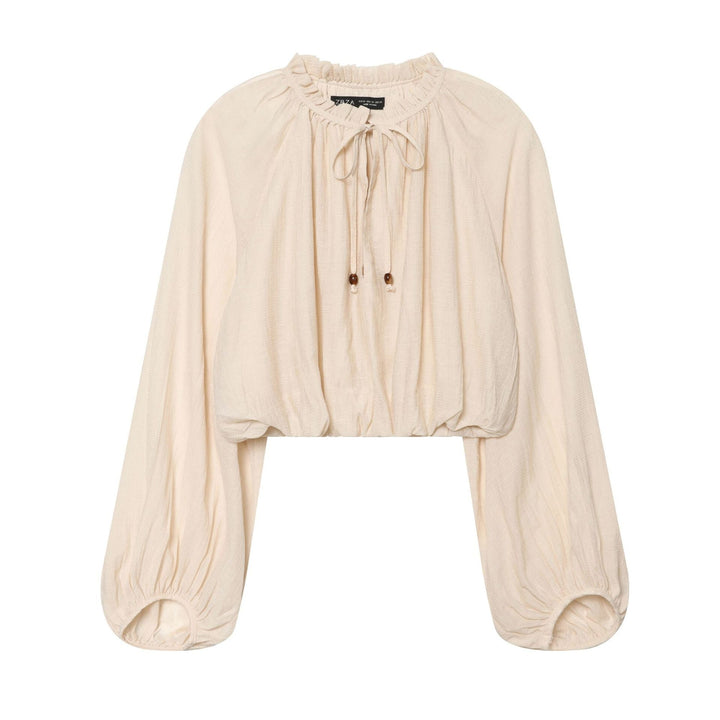 Women's midi skirt with high turnover waistband, fine pleat detailing and wooden button detail Mune Fashion