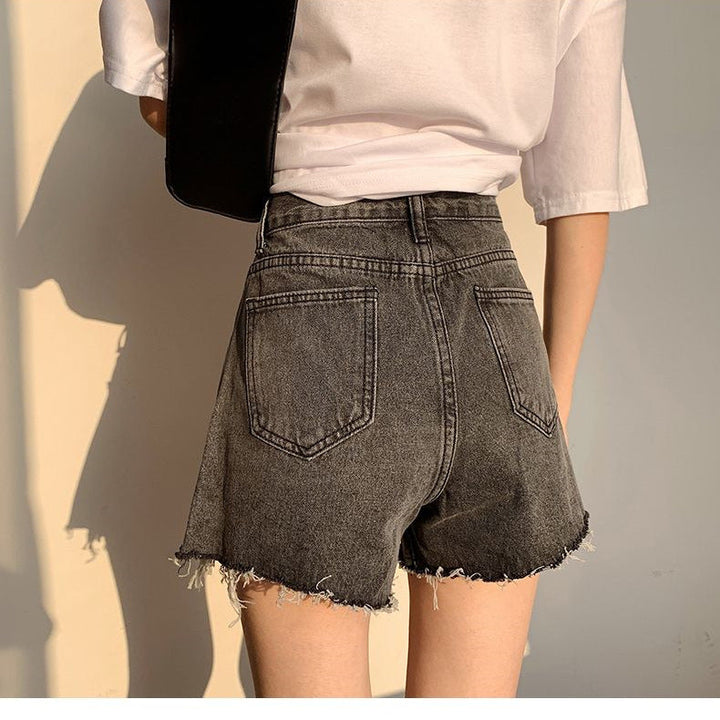 Denim Shorts in Trendy Destroyed Look