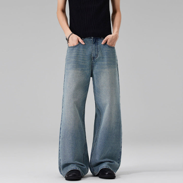 Women Ultra Wide Floor-Length Denim Palazzo Pants with Sculptural Width and Soft Bleach Accents Mune Fashion