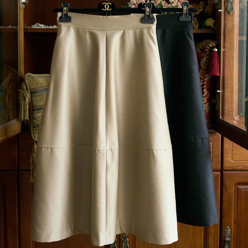 Women's midi skirt made of vegan leather with a high waist and tiered A-line Mune Fashion