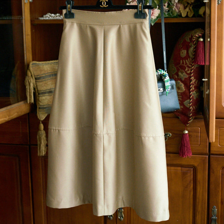 Women's midi skirt made of vegan leather with a high waist and tiered A-line Mune Fashion