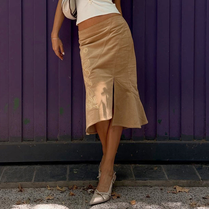 Women's flared midi skirt with side floral embroidery and ruffle Mune Fashion