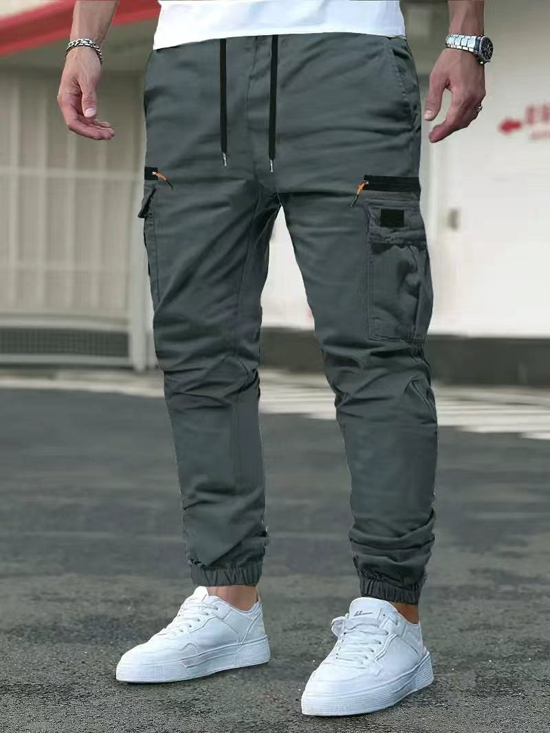 Men's cargo jogging pants with multifunctional zip and flap pockets, elastic waistband & cuffs Mune Fashion