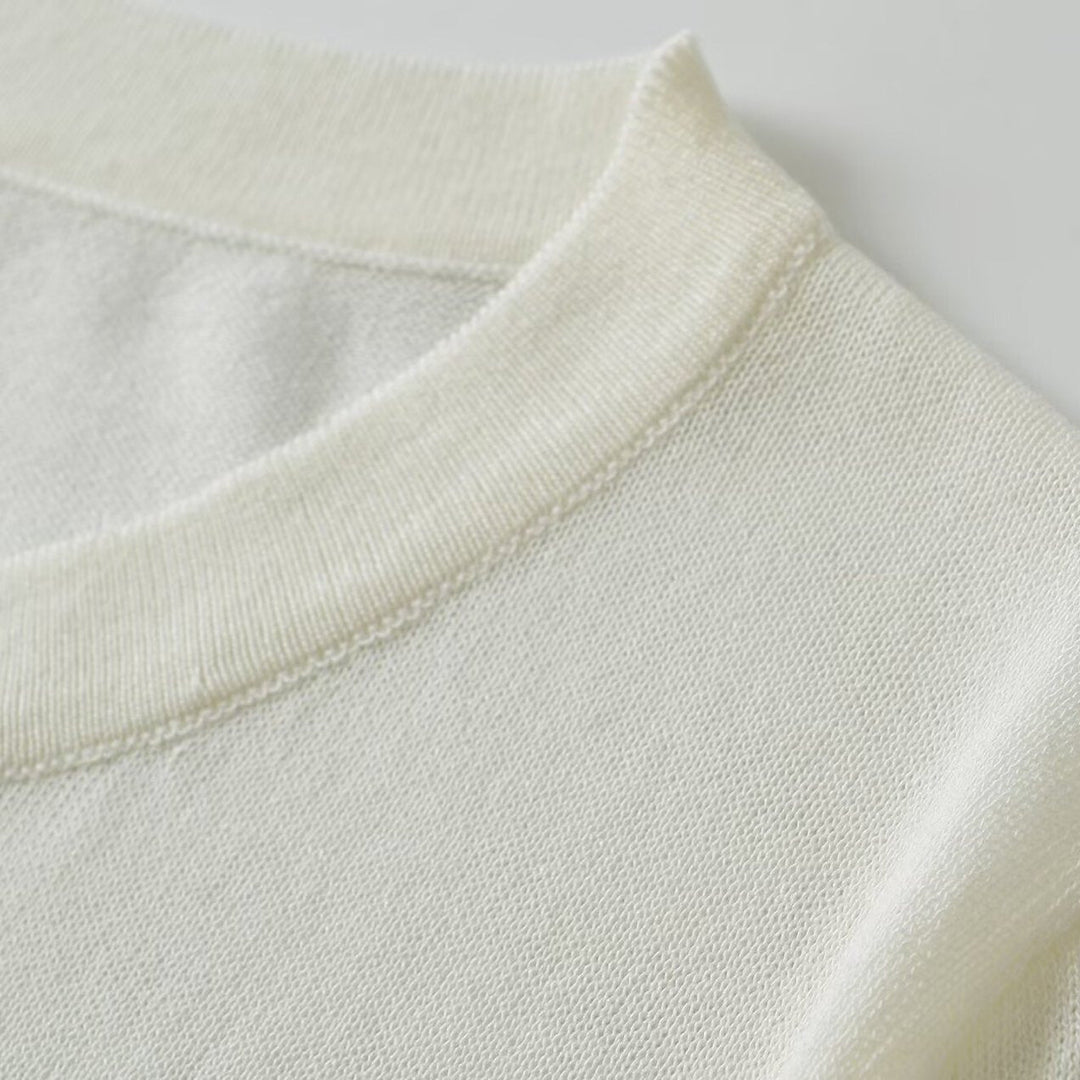 Ladies fine-knit henley pullover with button placket and ribbed hem Mune Fashion