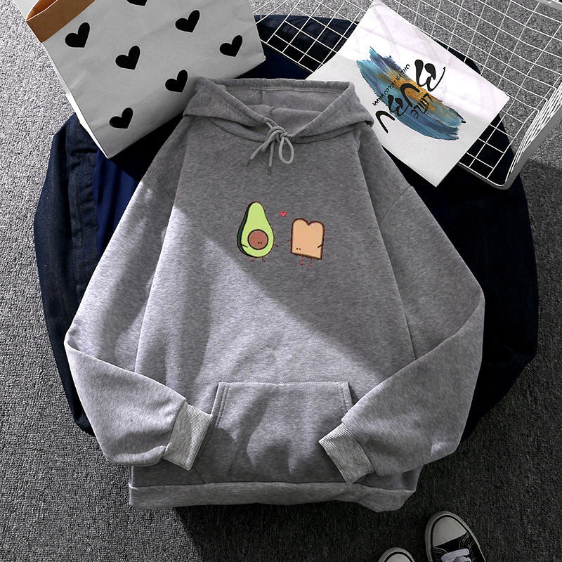 Women's cozy hooded sweatshirt with avocado toast illustration, soft fleece lining, and kangaroo pocket Mune Fashion