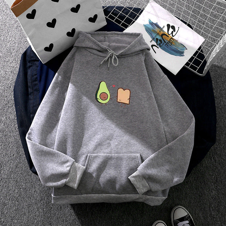 Women's cozy hooded sweatshirt with avocado toast illustration, soft fleece lining, and kangaroo pocket Mune Fashion