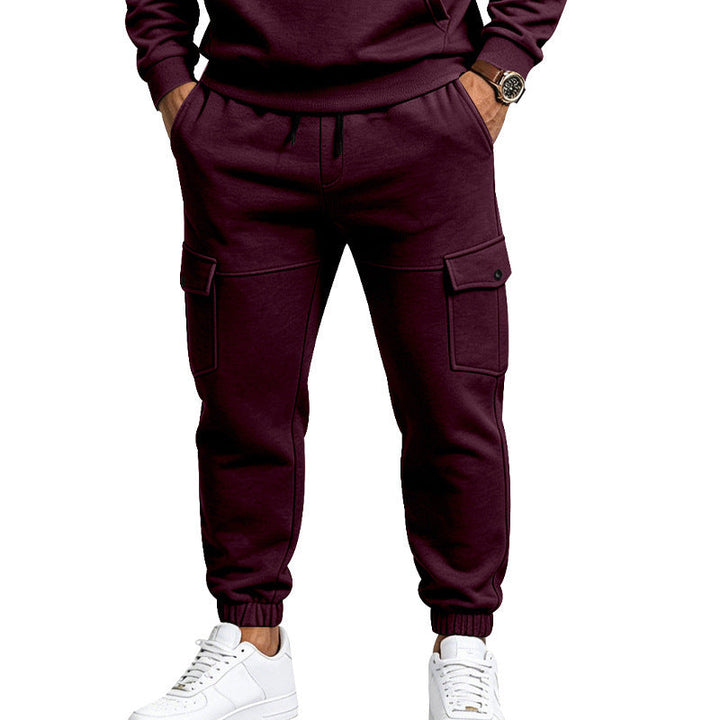 Men's cargo jogging pants with side flap pockets, drawstring and elastic cuffs Mune Fashion
